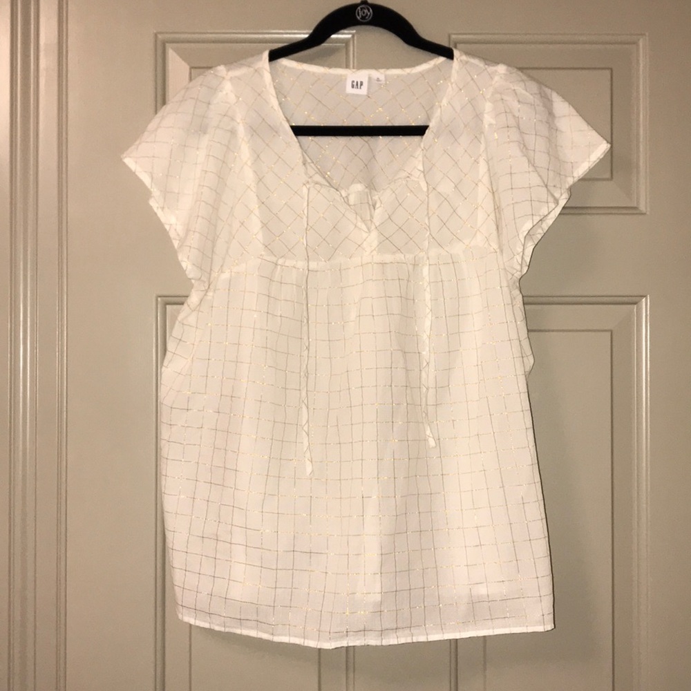 Cap sleeve with and gold blouse